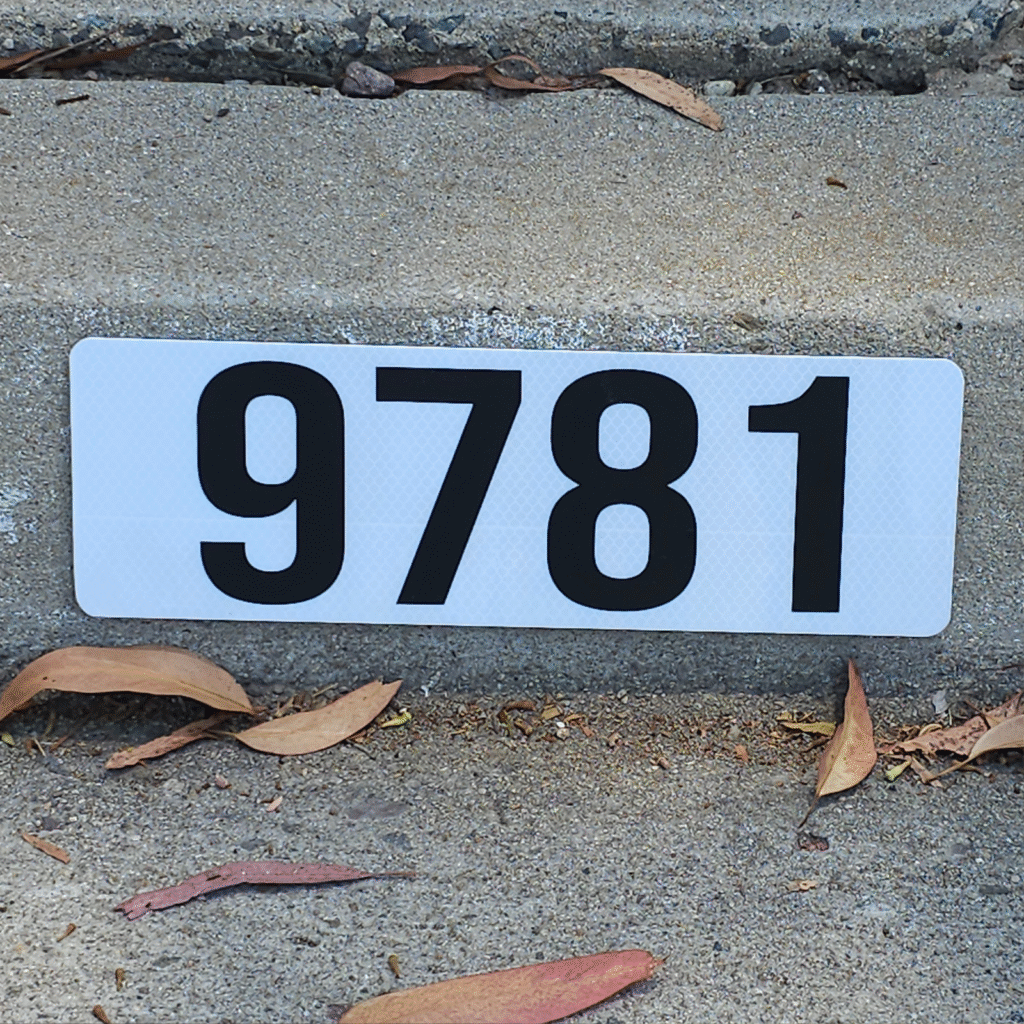 High Quality Reflective Curb Address Plates installed by Curb Painting San Diego.